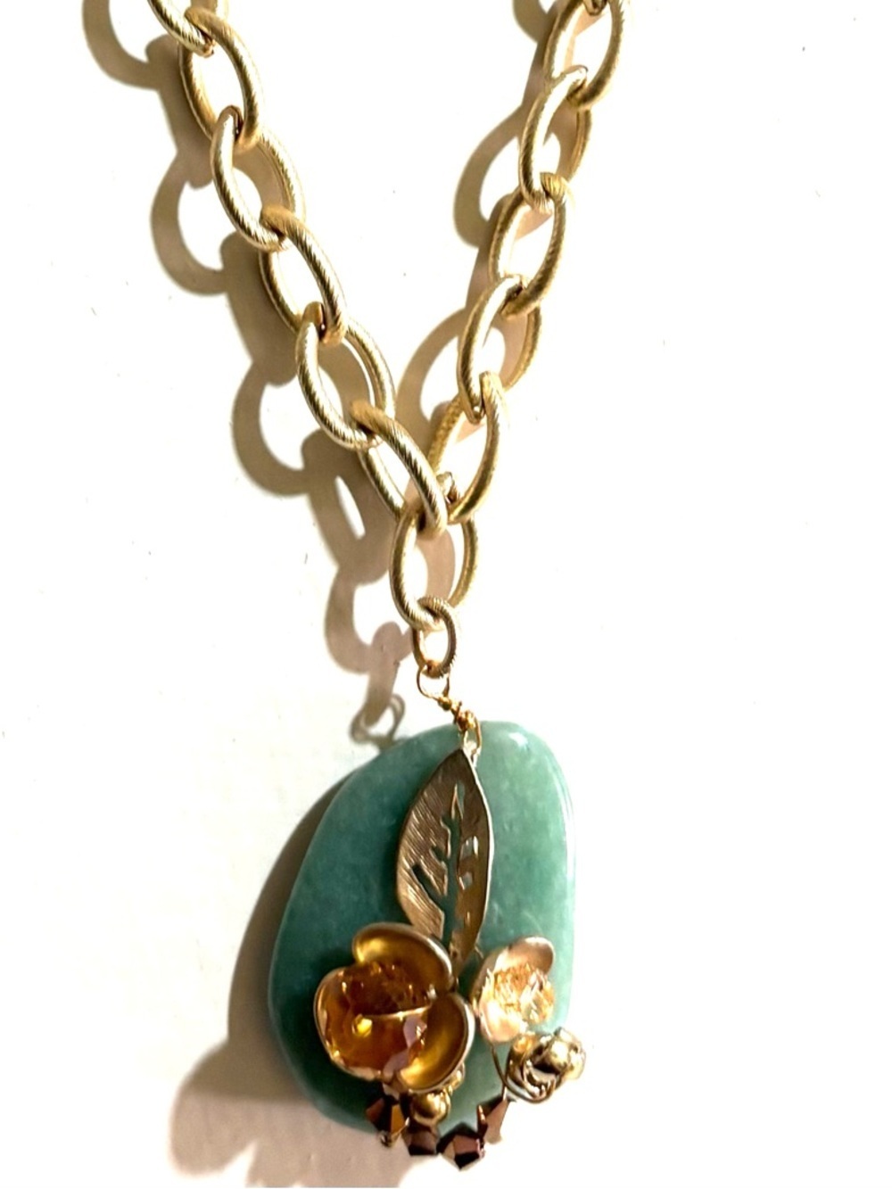 Gold Chain Necklace with Green Stone and Floral Pendant